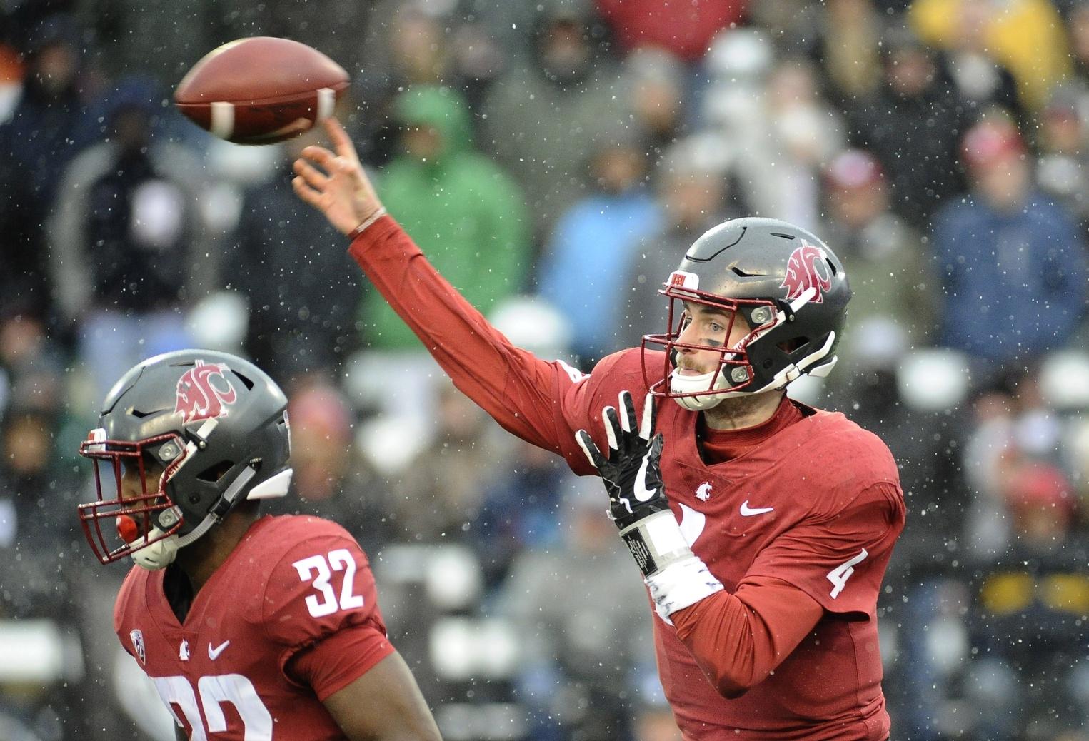 Washington State's Luke Falk passes in a game against Stanford.